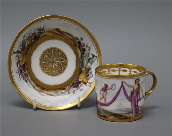 A Paris porcelain Cupid and Venus cabinet coffee can and saucer